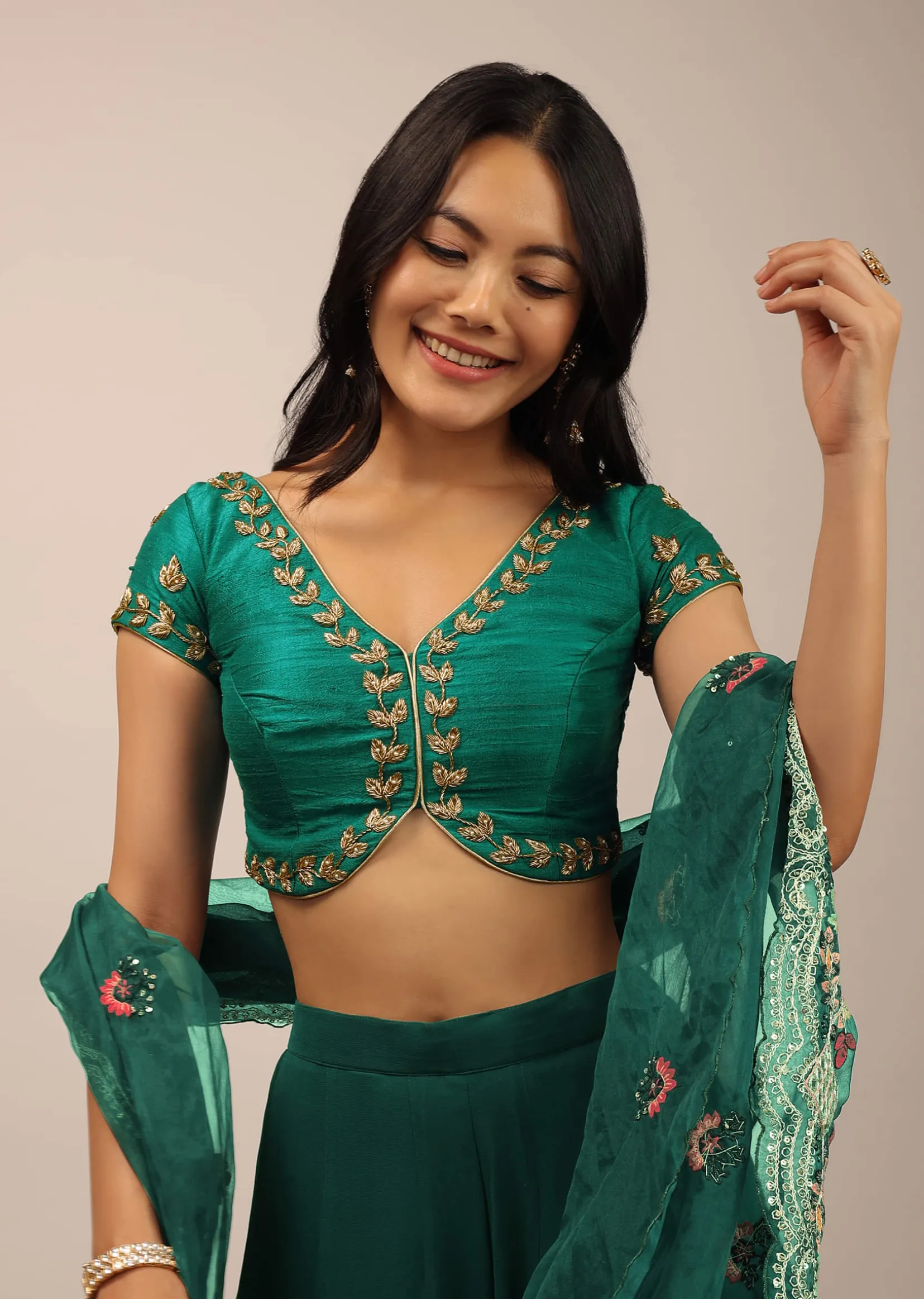 Peacock Green Blouse In Raw Silk With Zardosi Embroidery And A Diamond Cut Out On The Back