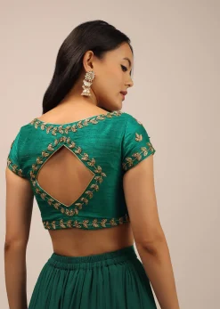 Peacock Green Blouse In Raw Silk With Zardosi Embroidery And A Diamond Cut Out On The Back