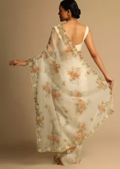 Pearl White Saree In Organza With Floral Print All Over And Moti Embroidered Border Along With Unstitched Blouse