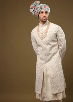 Pearl White Silk Sherwani Set With Exquisite Zari And Sequin Embroidery