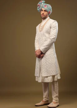 Pearl White Silk Sherwani Set With Exquisite Zari And Sequin Embroidery
