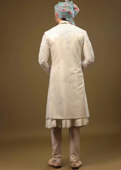 Pearl White Silk Sherwani Set With Exquisite Zari And Sequin Embroidery