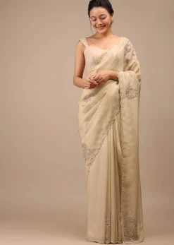 Pebble Brown Glass Tissue Saree Adorned With Floral Buttis, Zardosi Embroidery And 3D Sequins