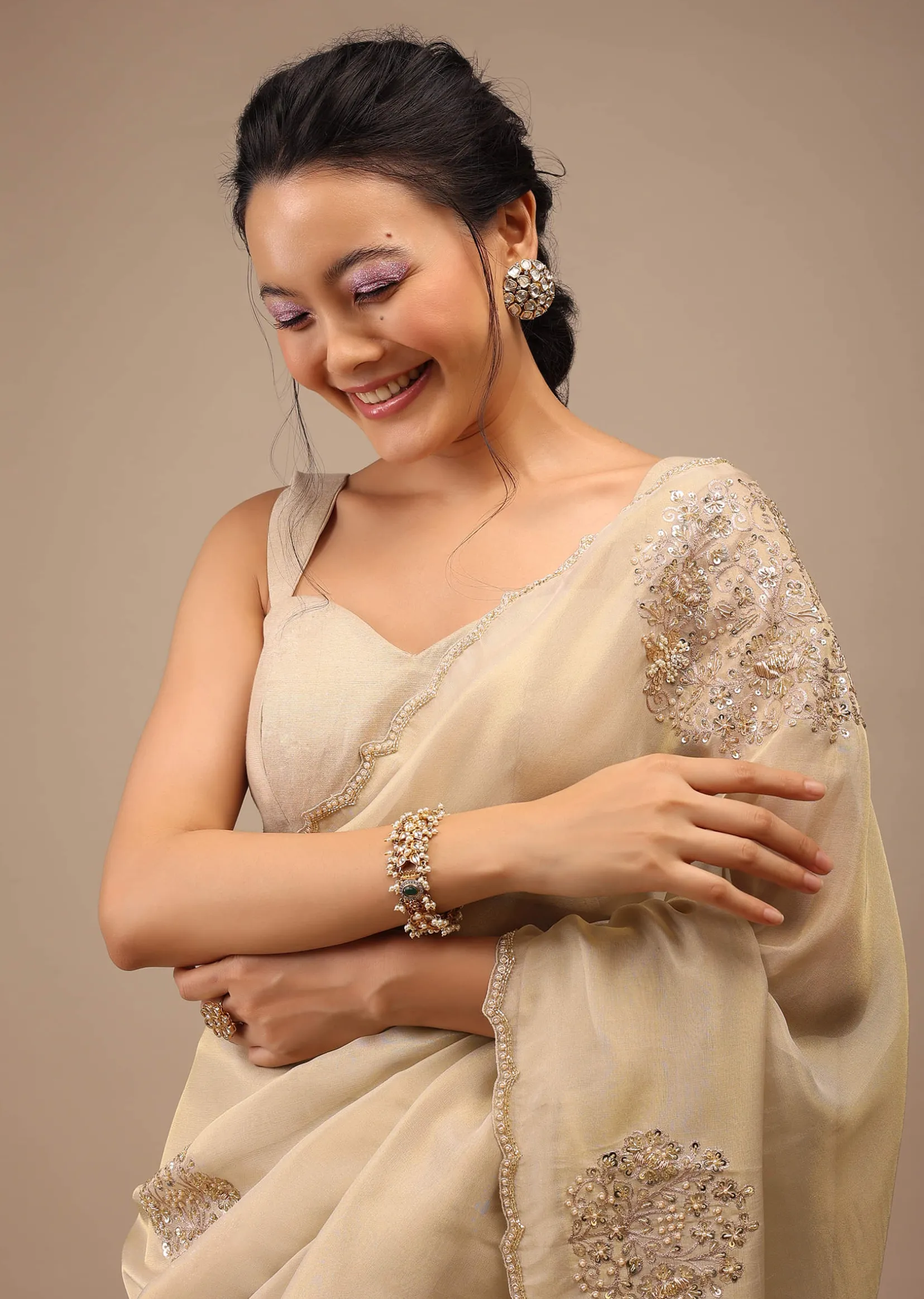 Pebble Brown Glass Tissue Saree Adorned With Floral Buttis, Zardosi Embroidery And 3D Sequins