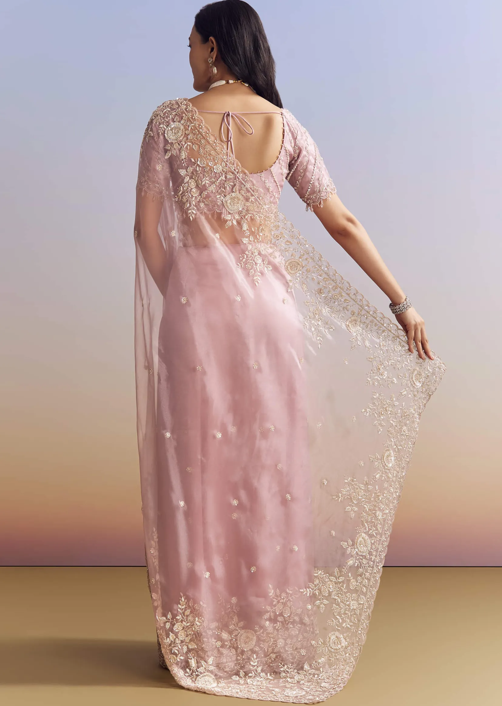 Pink Tissue Saree Adorned With Scallop Border And Heavy Embroidery