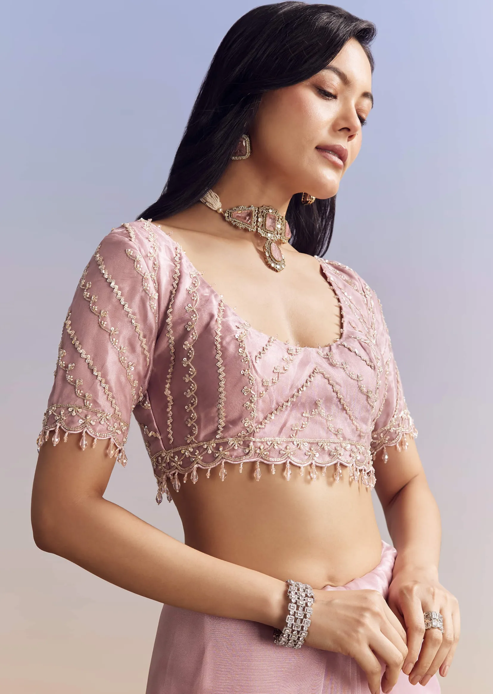 Pink Tissue Saree Adorned With Scallop Border And Heavy Embroidery