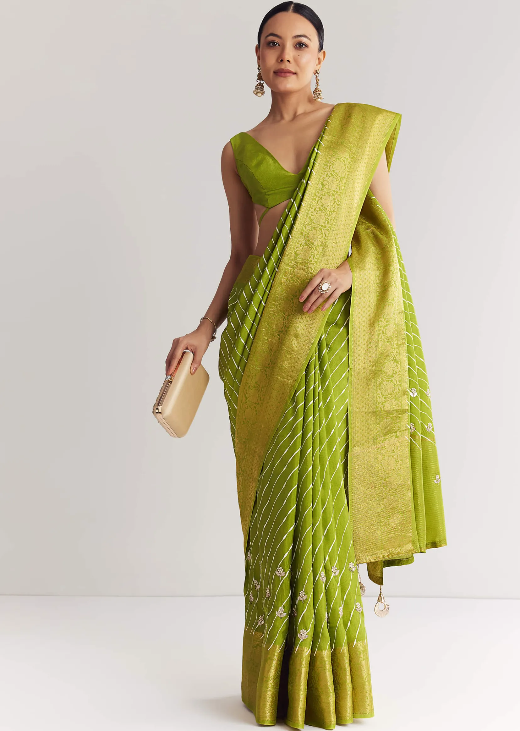Pista Green Saree With Lehariya Print And Floral Gotapatti And Moti Work.