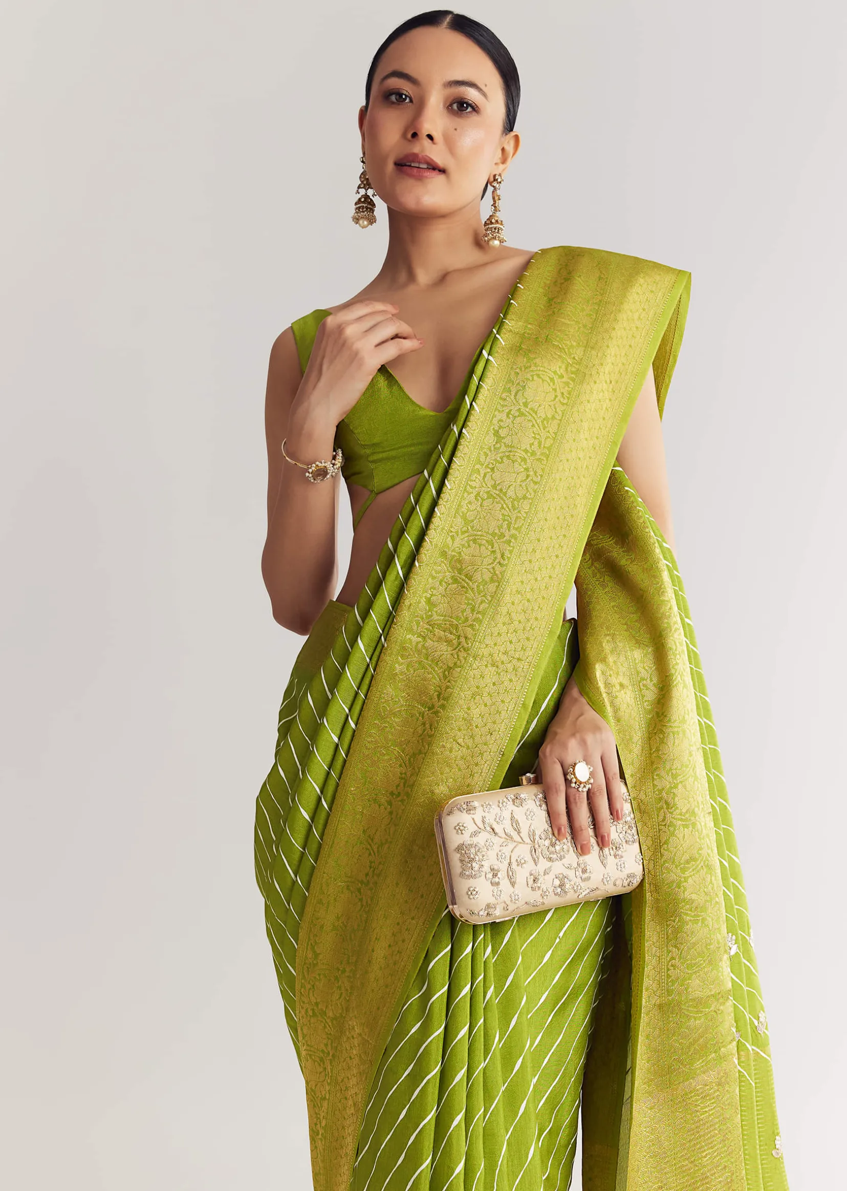 Pista Green Saree With Lehariya Print And Floral Gotapatti And Moti Work.