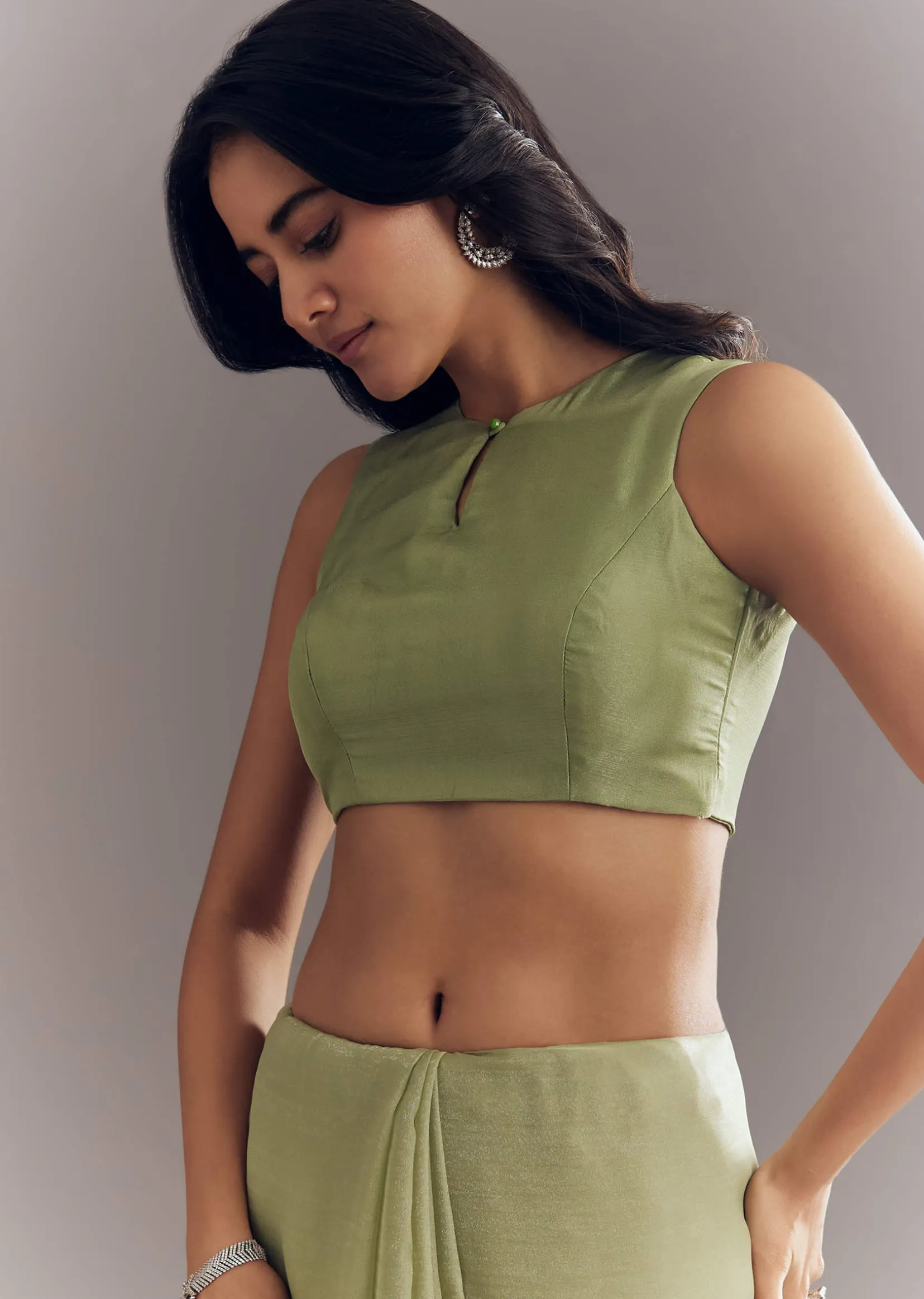 Pista Green Tissue Saree With Leaf Motif Embroidery In Sequins And Cutdana