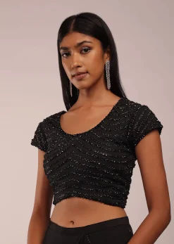Pitch Black Saree With Three Tones Of Layered Frills On The Bottom Embellished In Stones And Sequins With A Tassel On The Pallu Corner