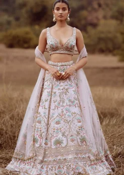 Powder Pink Lehenga Choli In Raw Silk With Colorful Resham And Cut Dana Embroidered Summertime Flowers And Mughal Motifs