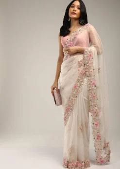 Powder White Saree In Organza With 3D Flower Embroidered Border And Buttis Featuring Multi Colored Moti And Sequins
