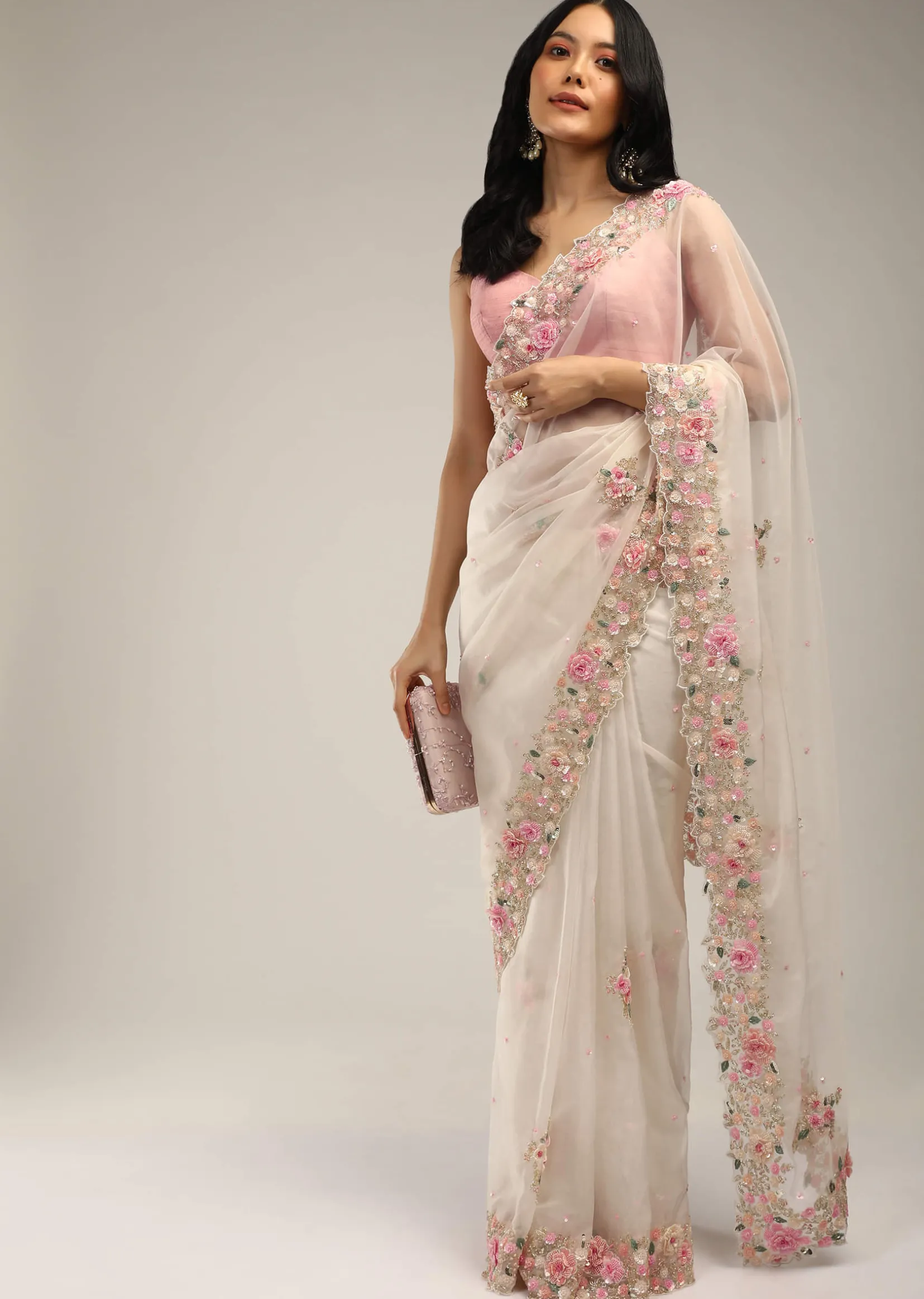 Powder White Saree In Organza With 3D Flower Embroidered Border And Buttis Featuring Multi Colored Moti And Sequins
