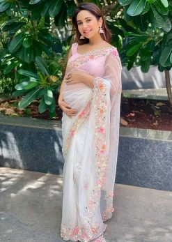 Powder White Saree In Organza With 3D Flower Embroidered Border And Buttis Featuring Multi Colored Moti And Sequins