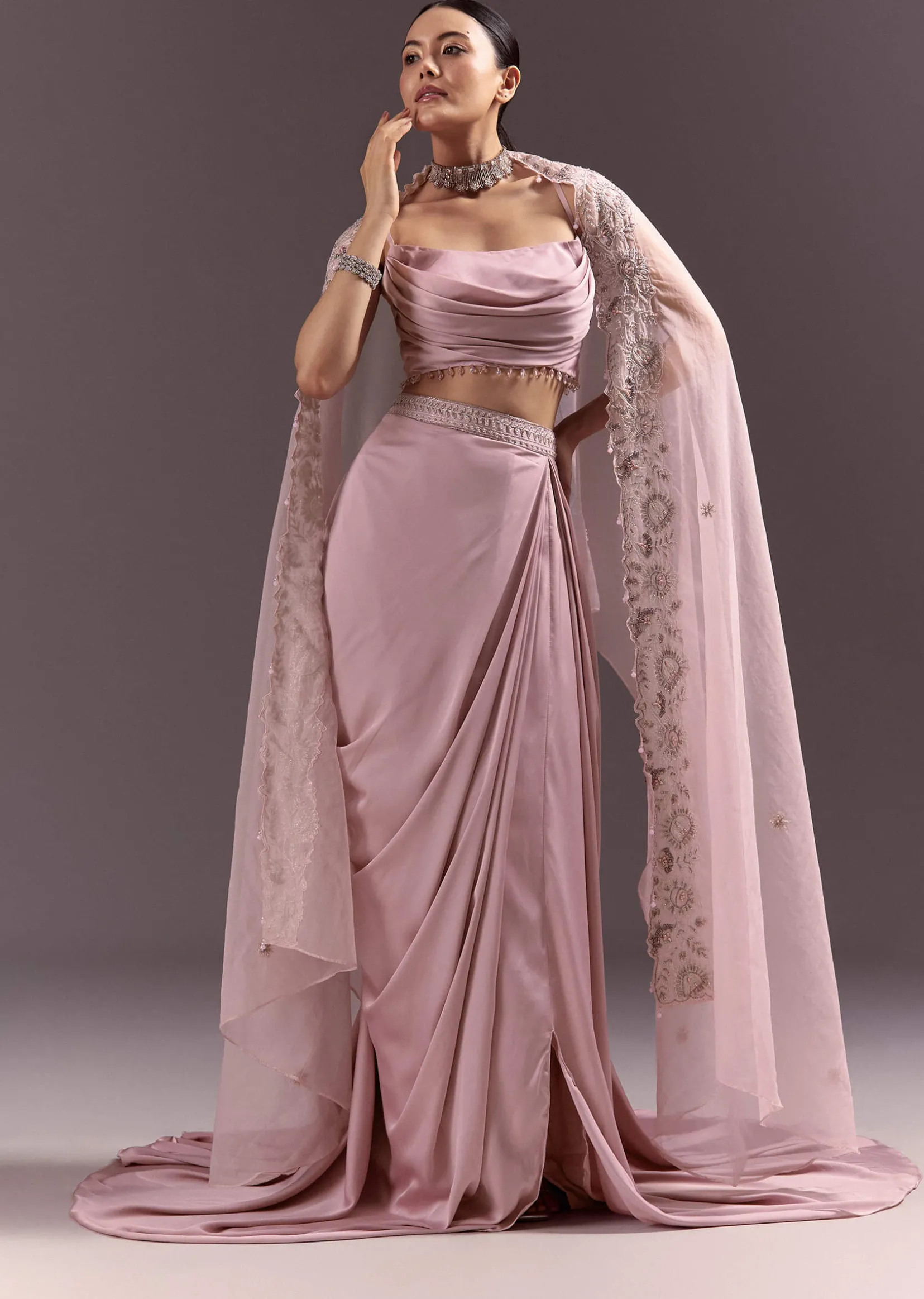 Purple Satin Indowestern Skirt With Fancy Net Blouse And Cape