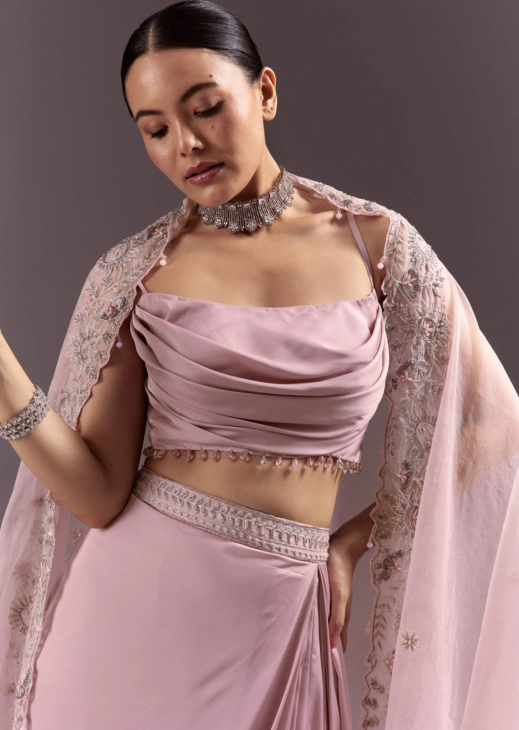 Purple Satin Indowestern Skirt With Fancy Net Blouse And Cape