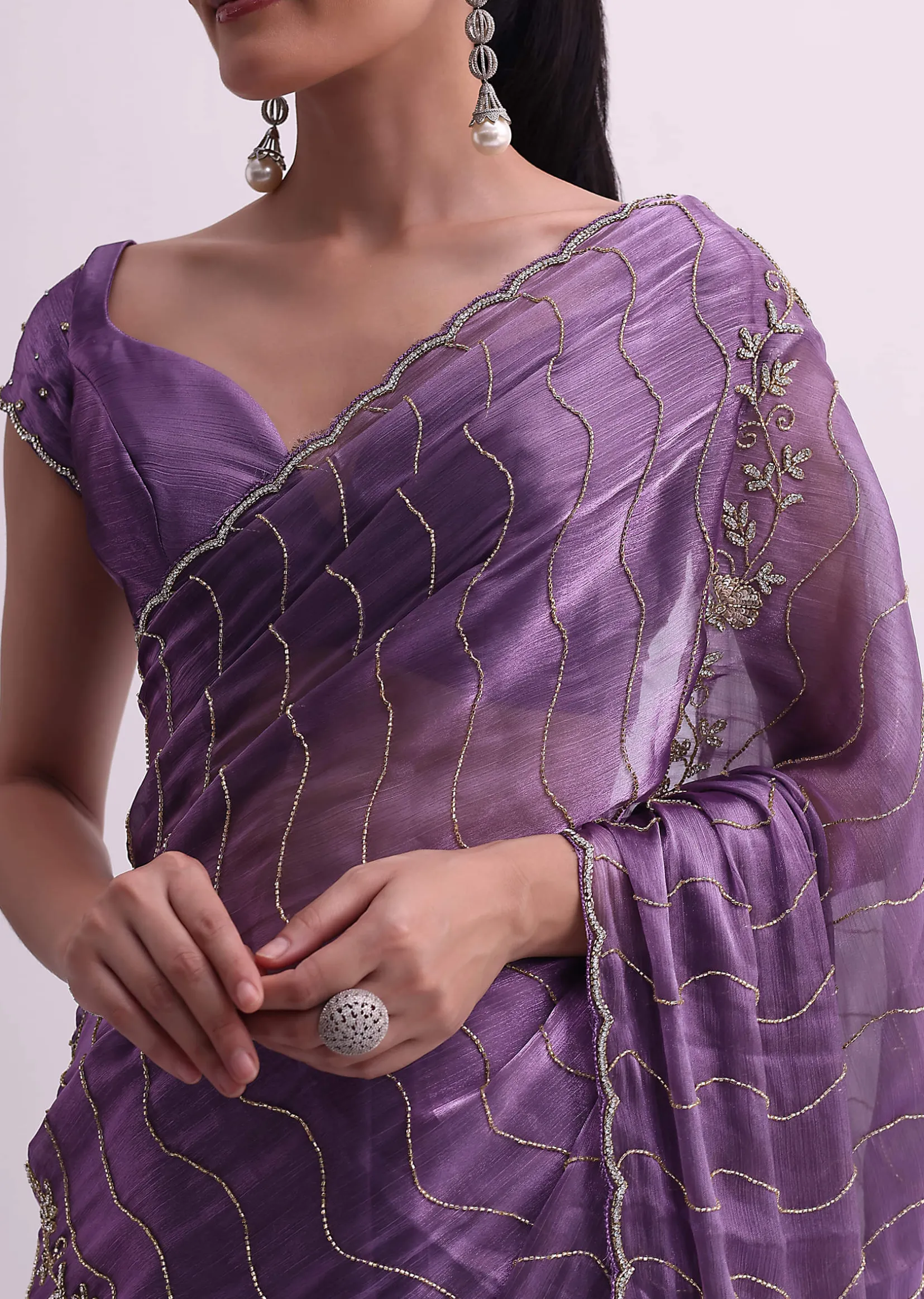Purple Satin Saree With Cutdana Embellishment And Unstitched Blouse Fabric