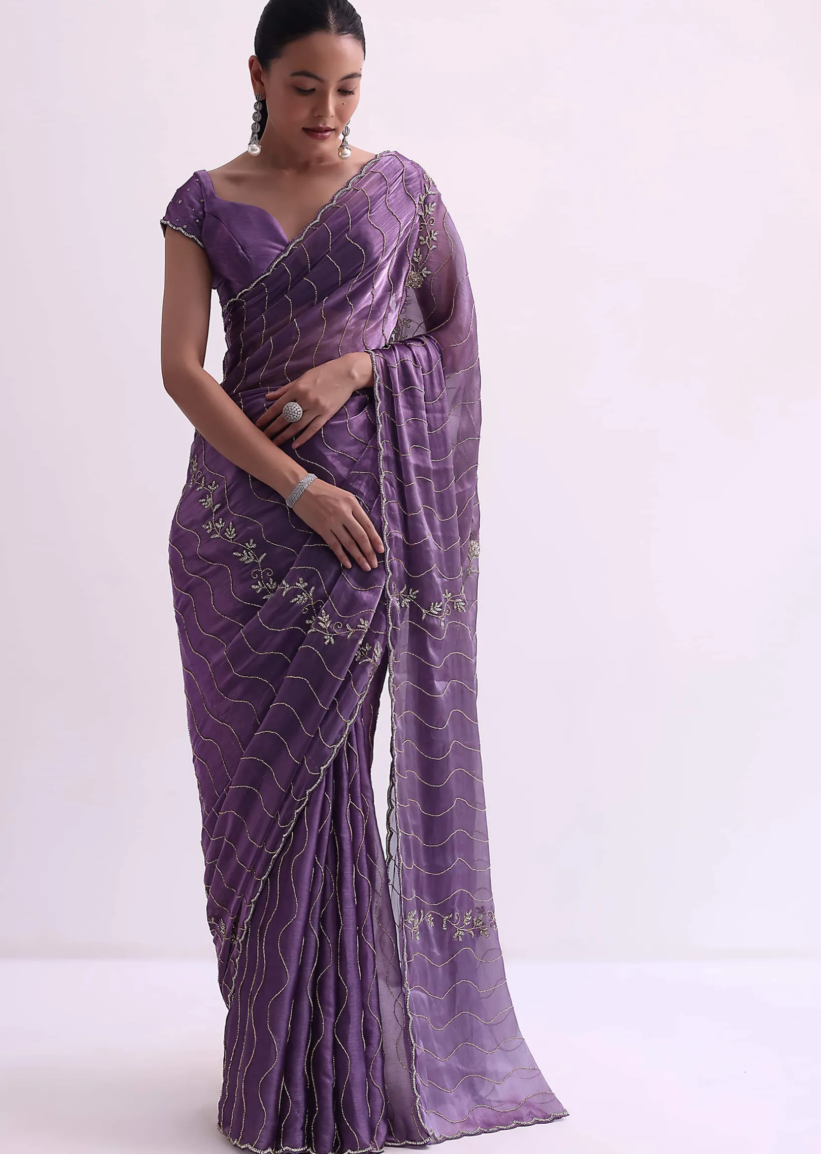 Purple Satin Saree With Cutdana Embellishment And Unstitched Blouse Fabric