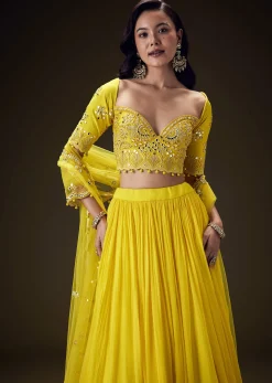 Radiant Yellow Georgette Lehenga With Mirror Work Blouse And Dupatta