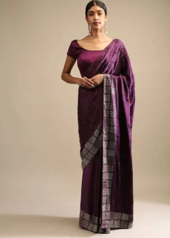 Raisin Purple Saree In Satin With Two Toned Kundan Embellished Border And Ready Stitched Blouse