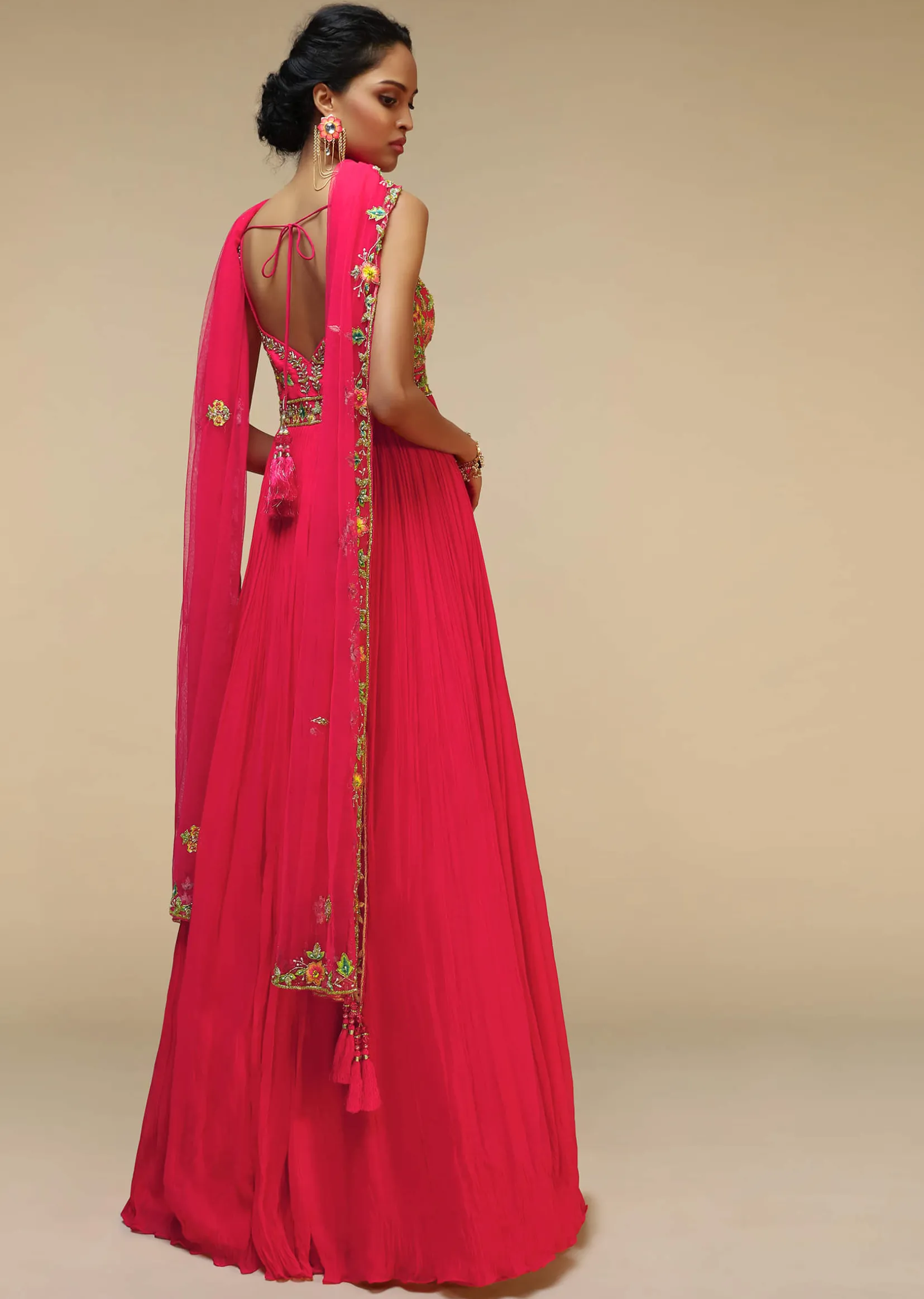Rani Pink Anarkali Suit In Crushed Georgette With A Hand Embroidered Bodice Adorned In Multi Colored Resham And Sequins Work