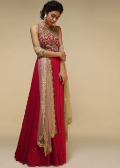 Rani Pink Anarkali Suit With Halter Neckline And Adorned In Multicolored Hand Embroidered Floral Design On The Bodice