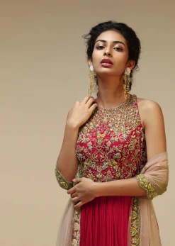 Rani Pink Anarkali Suit With Halter Neckline And Adorned In Multicolored Hand Embroidered Floral Design On The Bodice