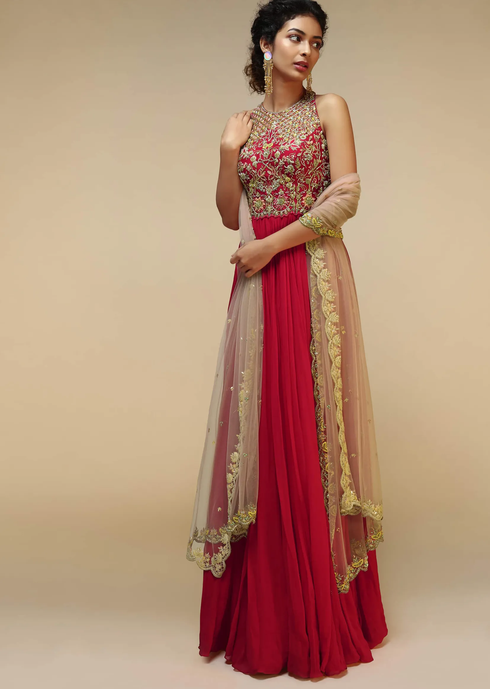 Rani Pink Anarkali Suit With Halter Neckline And Adorned In Multicolored Hand Embroidered Floral Design On The Bodice