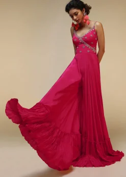 Rani Pink Jumpsuit With An Overlapping Neckline Adorned In Hand Embroidered Buttis Using Cut Dana And Sequins