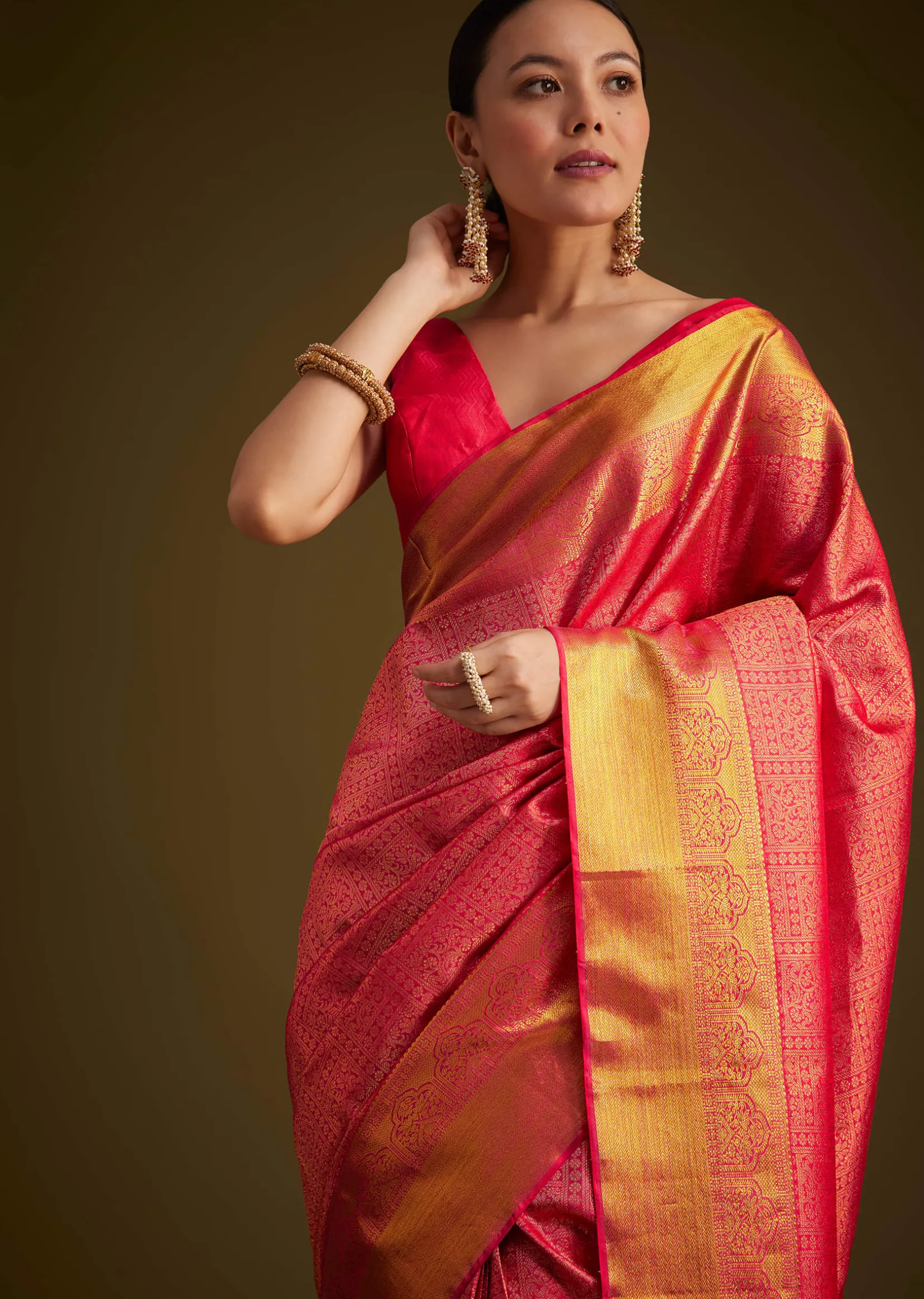 Rani Pink Kanjivaram Silk Saree With Golden Zari Detailing