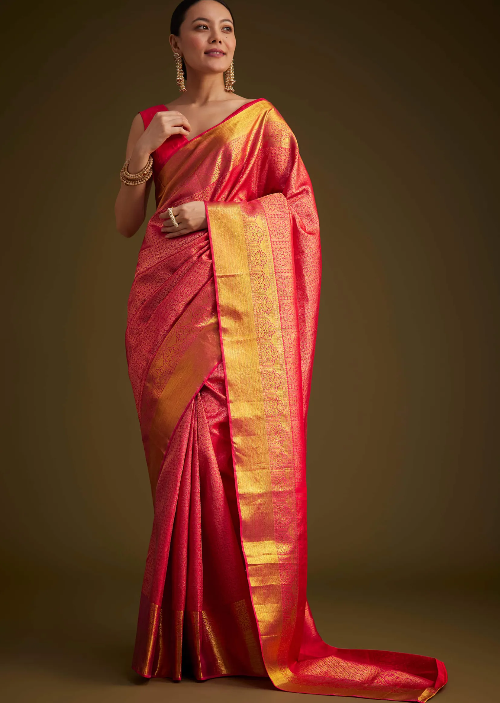 Rani Pink Kanjivaram Silk Saree With Golden Zari Detailing