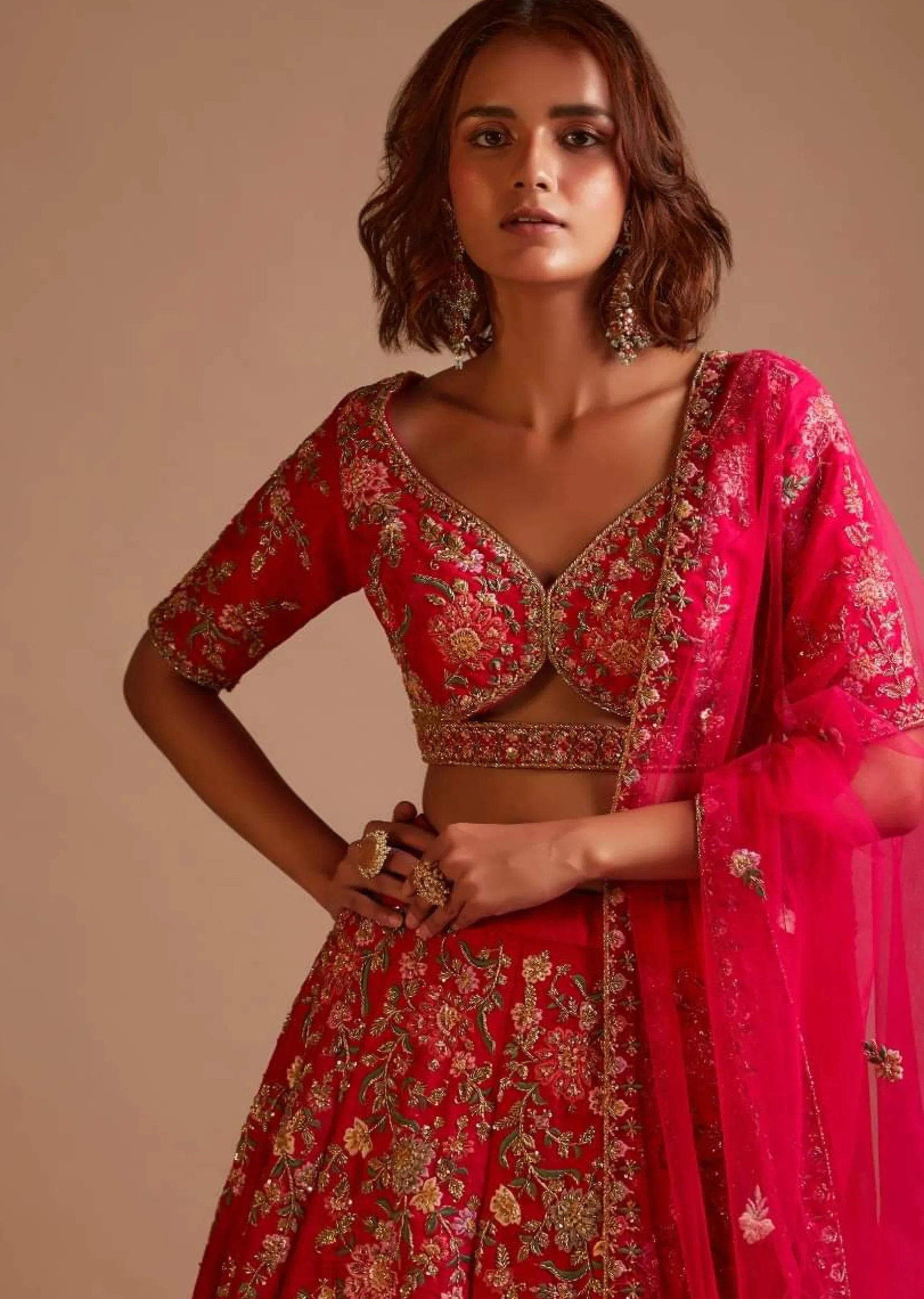 Rani Pink Lehenga Choli In Raw Silk With Hand Embroidered Cluster Of Flowers Cascading Into Floral Buttis