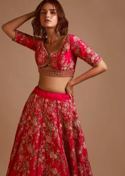 Rani Pink Lehenga Choli In Raw Silk With Hand Embroidered Cluster Of Flowers Cascading Into Floral Buttis