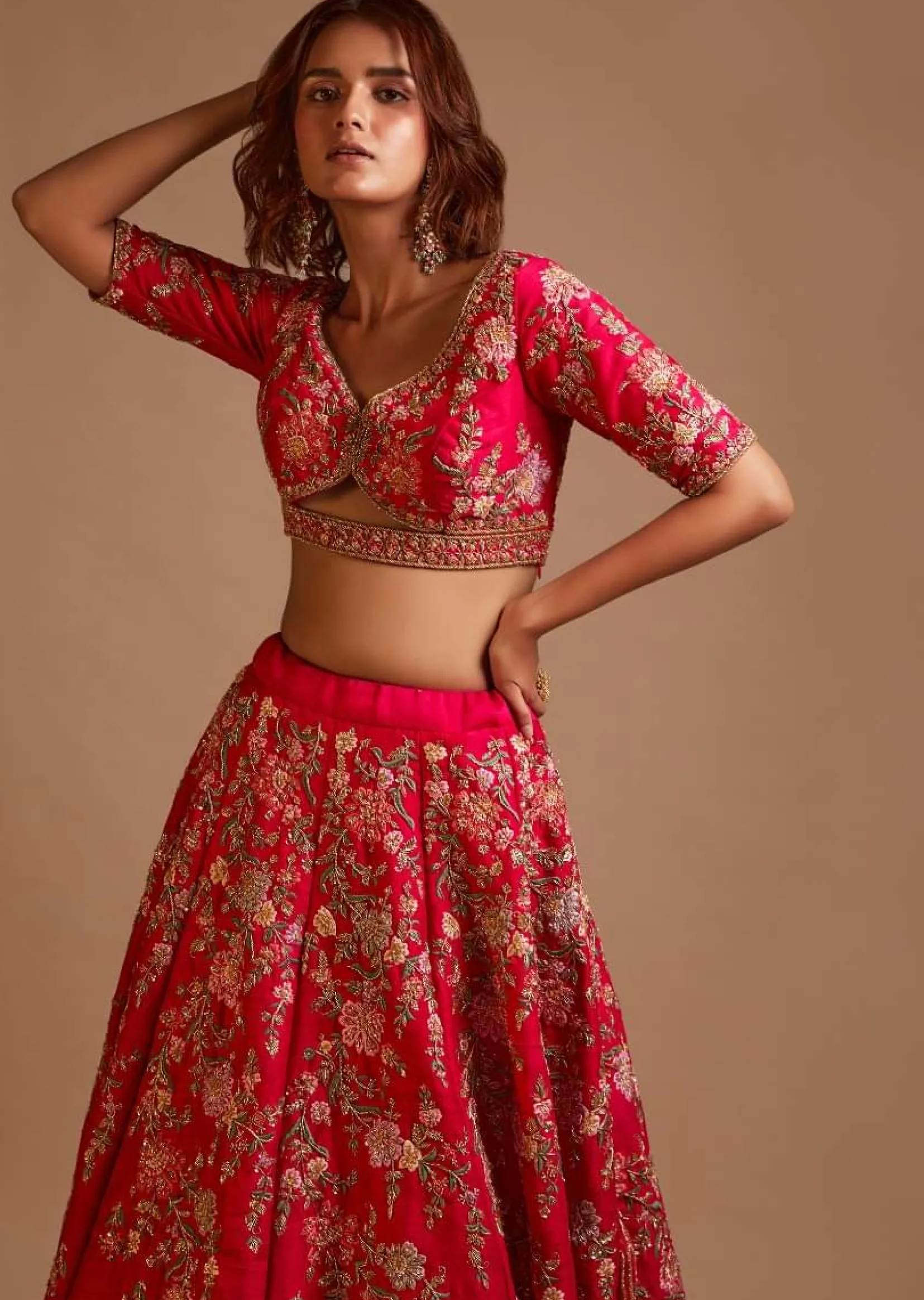 Rani Pink Lehenga Choli In Raw Silk With Hand Embroidered Cluster Of Flowers Cascading Into Floral Buttis
