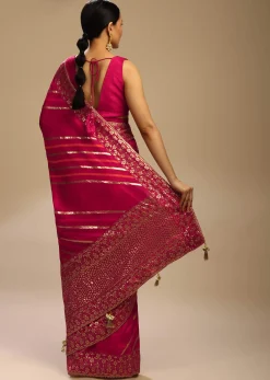 Rani Pink Saree In Dola Silk With Multi Colored Woven Diagonal Stripes And Floral Border