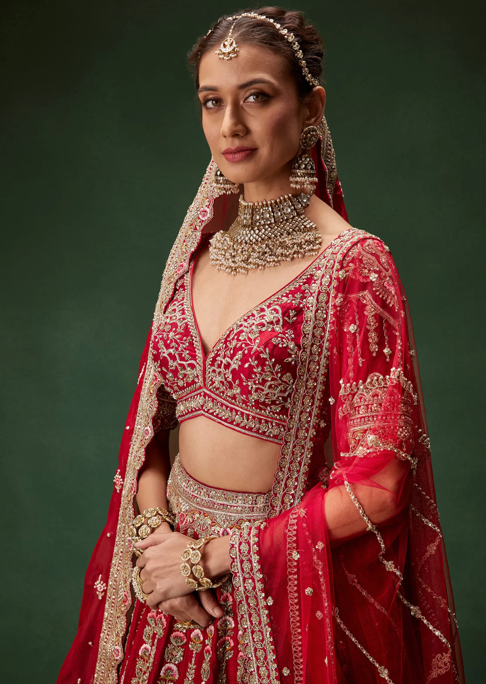 Red Bridal Lehenga With Intricate Hand Embroidery And Double Dupatta Drape
