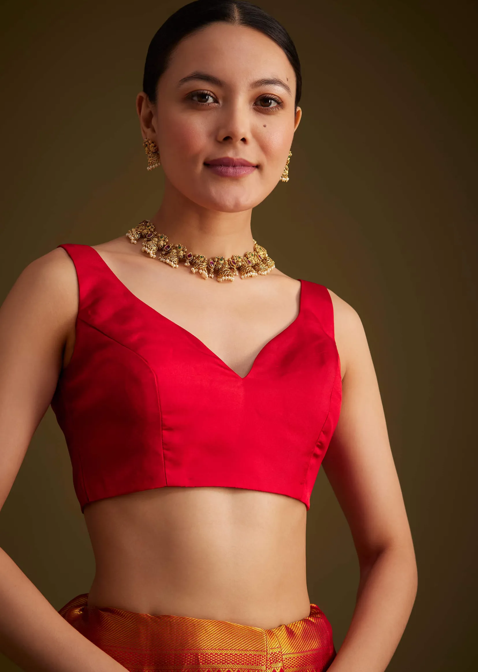 Red Kanjivaram Silk Saree With Golden Zari Detailing