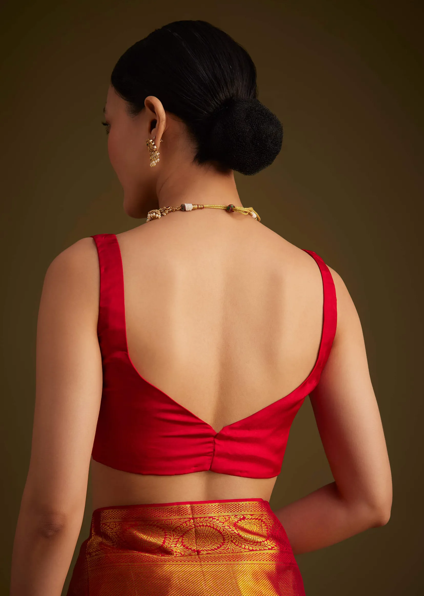 Red Kanjivaram Silk Saree With Golden Zari Detailing