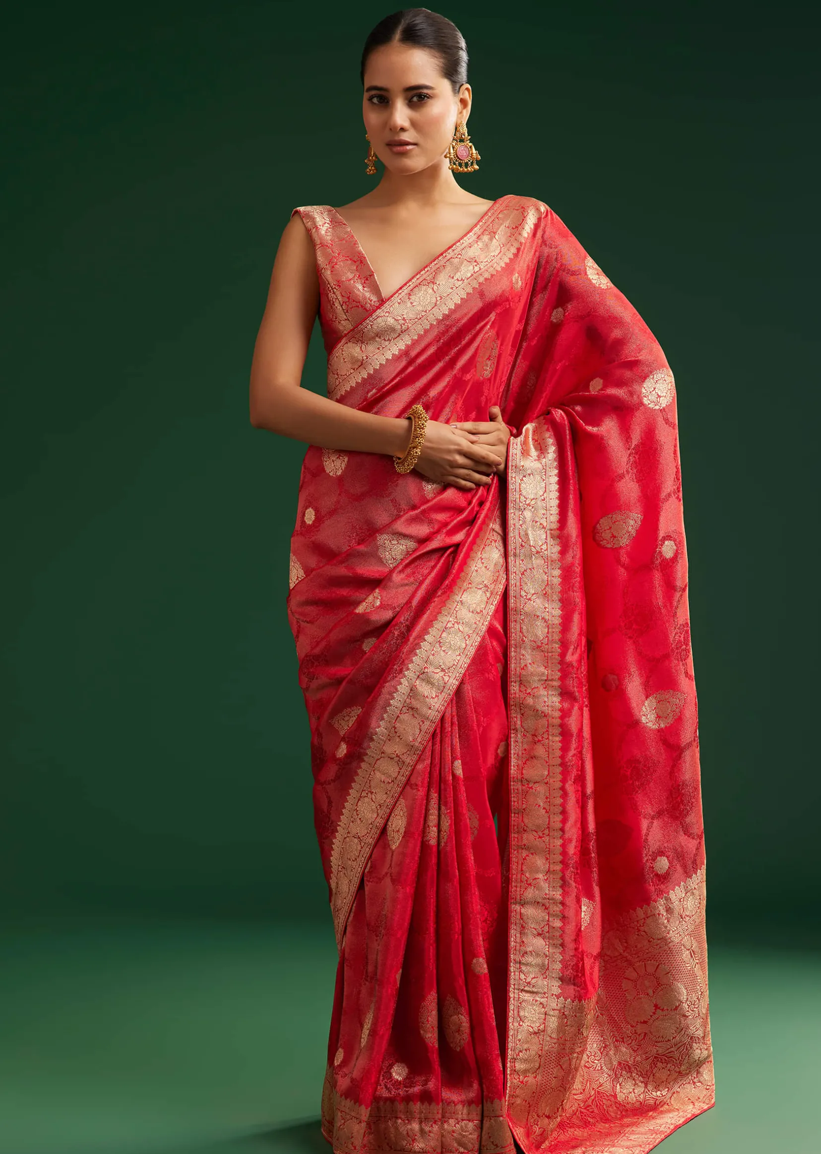 Red Saree With Zari Motif and Heavy Embroidered Blouse