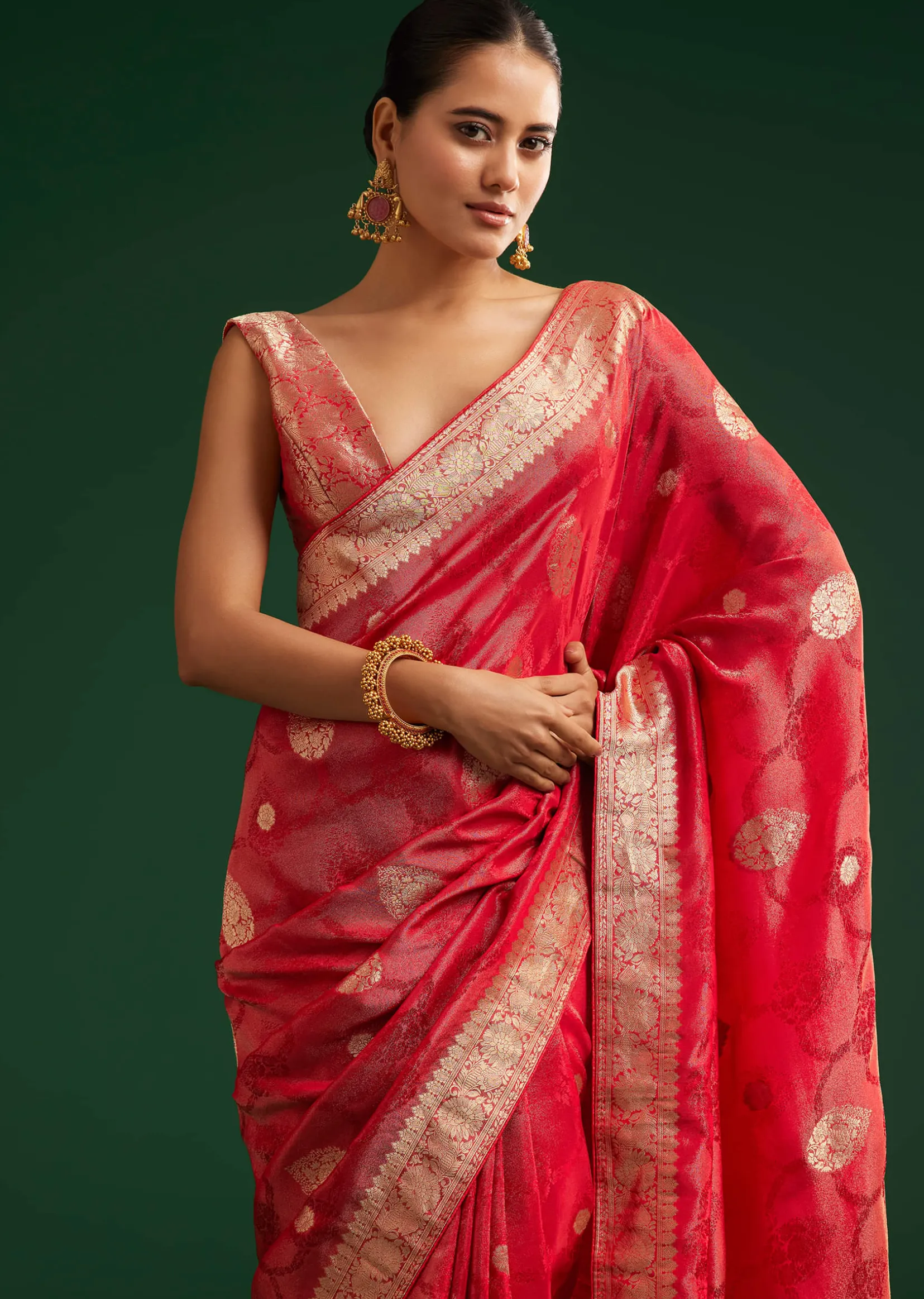 Red Saree With Zari Motif and Heavy Embroidered Blouse