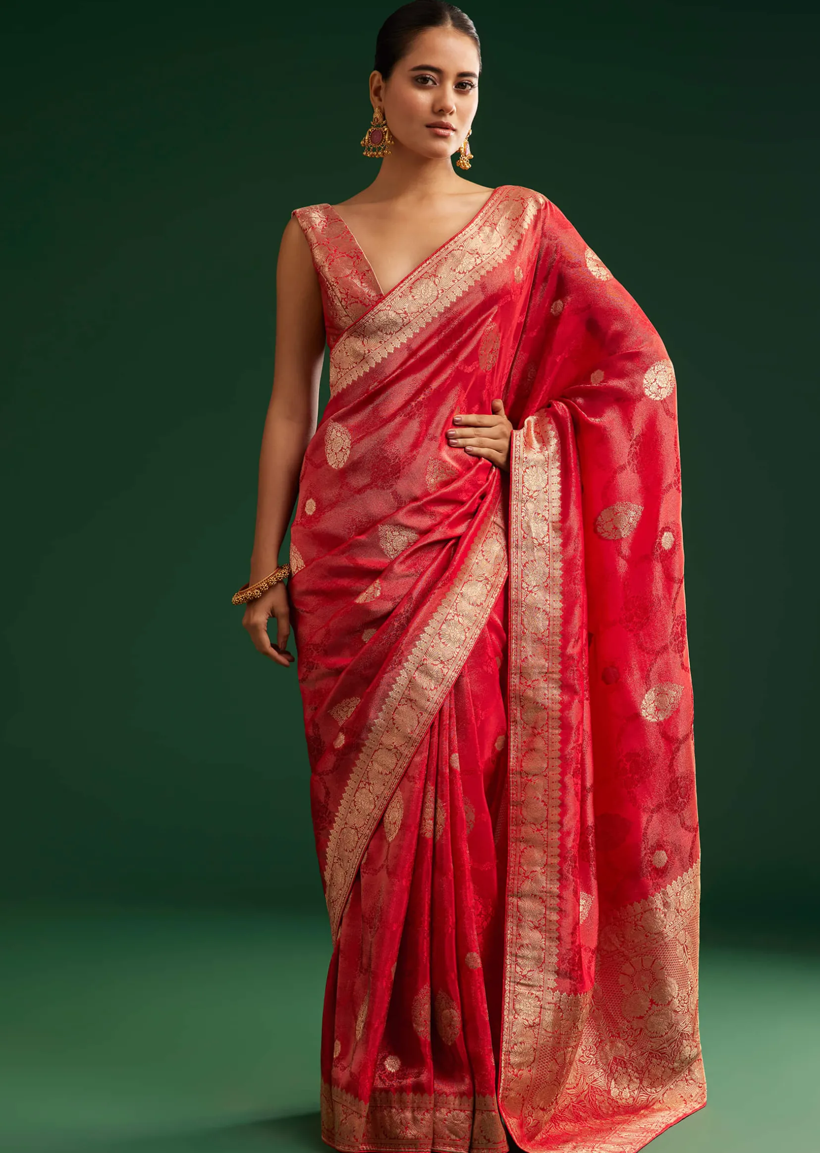 Red Saree With Zari Motif and Heavy Embroidered Blouse