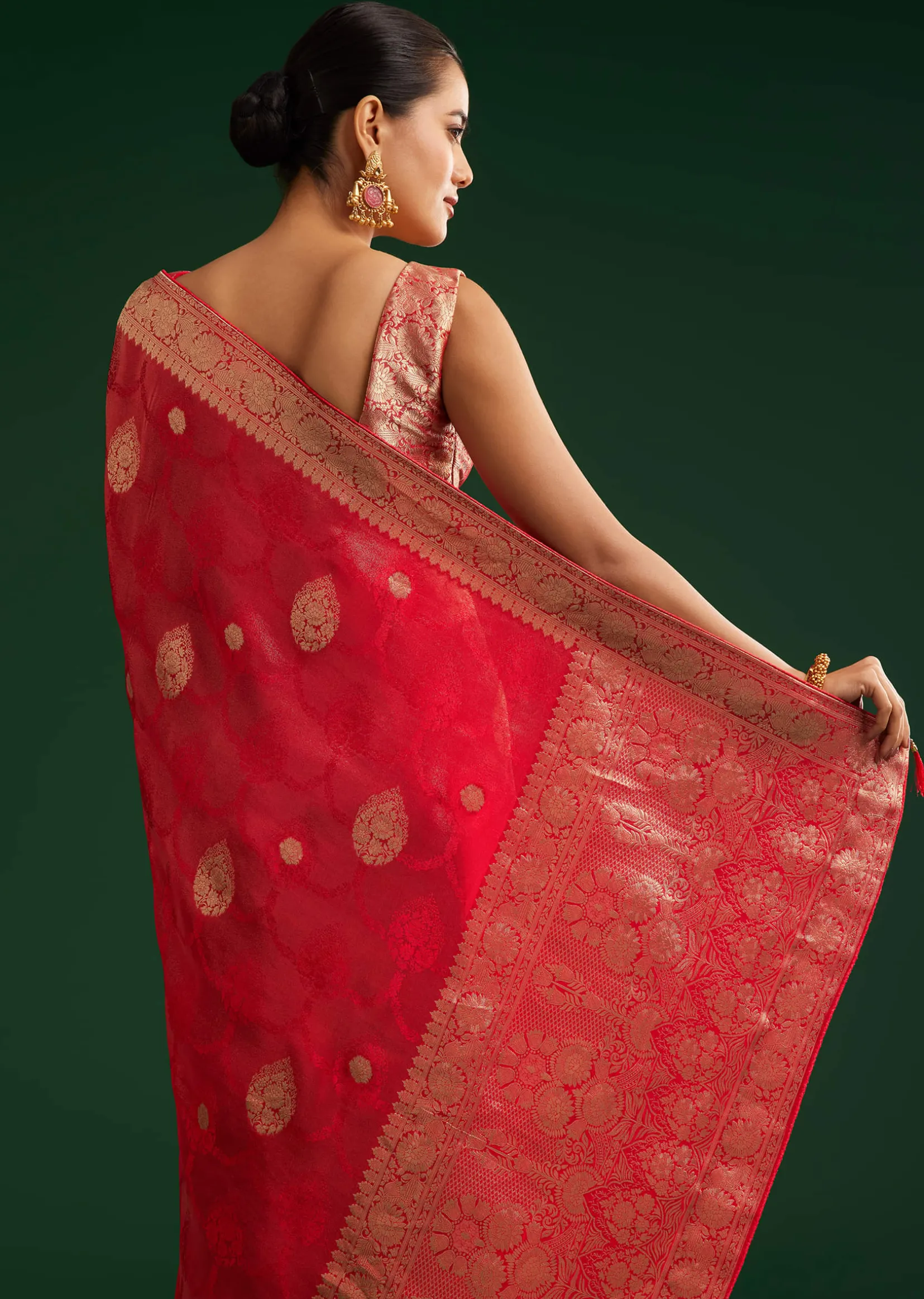 Red Saree With Zari Motif and Heavy Embroidered Blouse