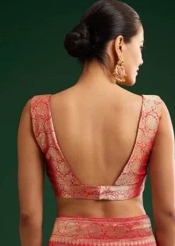 Red Saree With Zari Motif and Heavy Embroidered Blouse