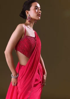 Reddish Pink Pre Stitched Draped Saree With Corset Fit Embroidered Blouse