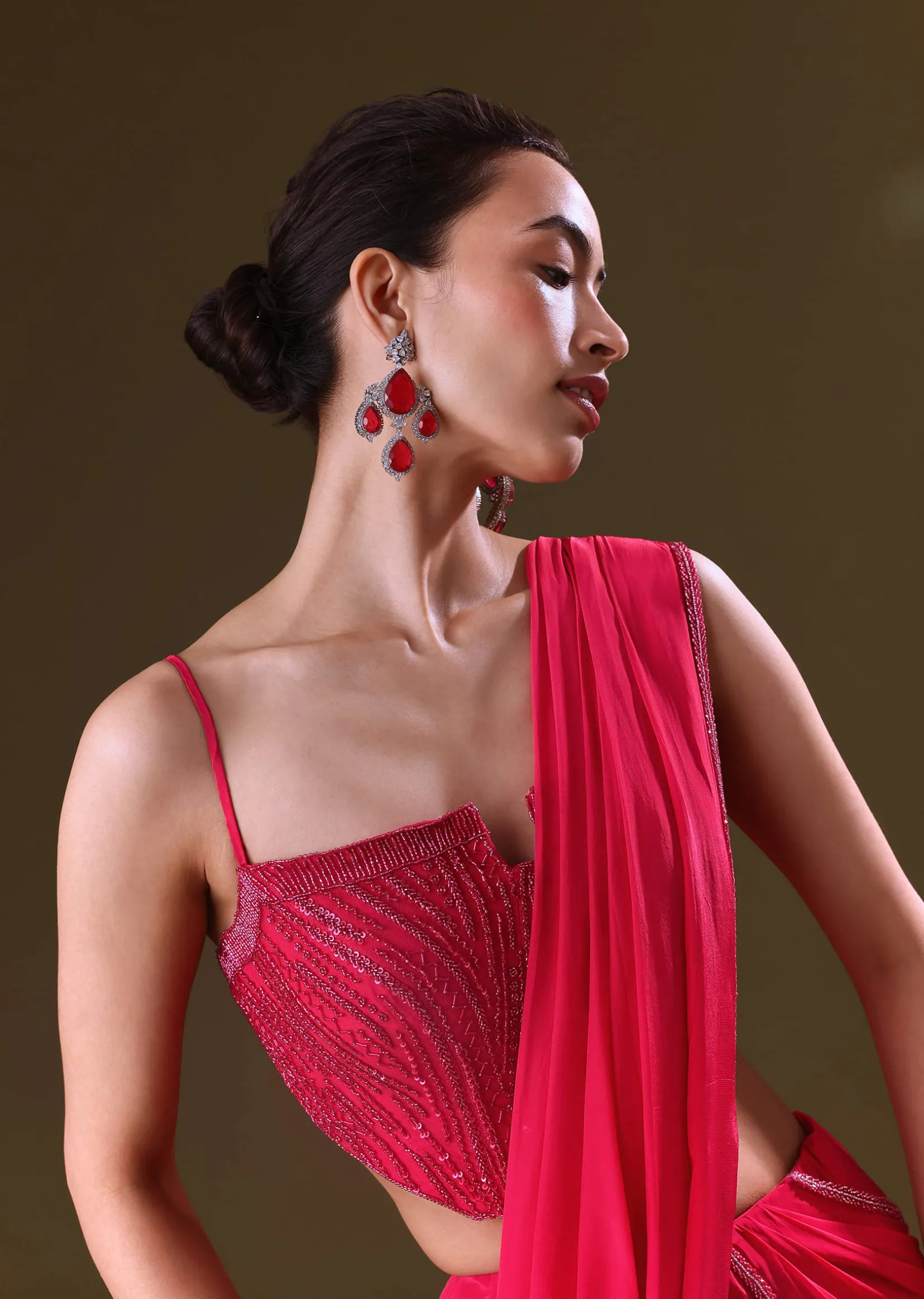 Reddish Pink Pre Stitched Draped Saree With Corset Fit Embroidered Blouse