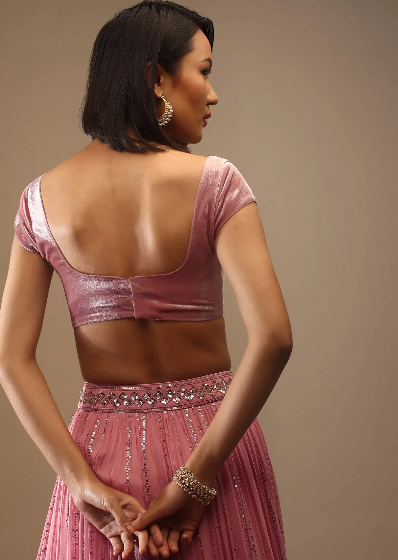 Rose Gold Velvet Blouse In Cap Sleeves With A Sweetheart Neckline Padded And A Back Hooks Closure