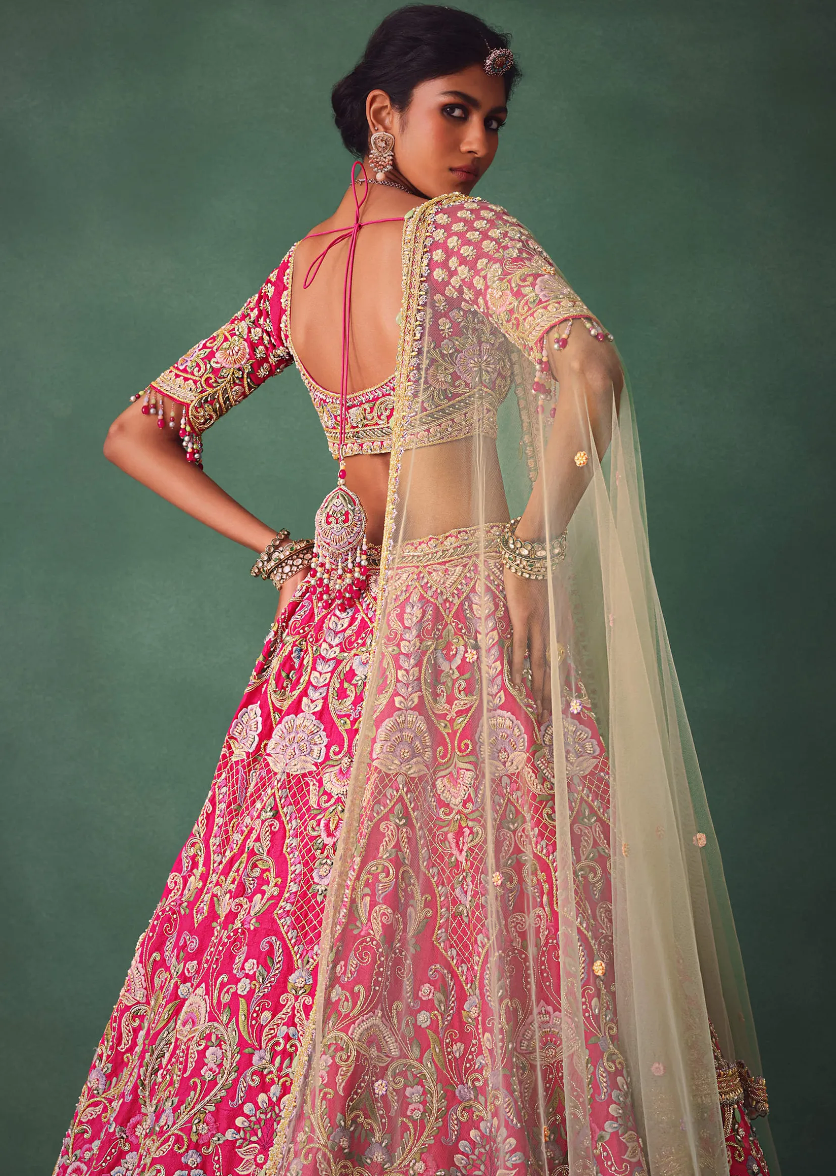 Rose Pink Bridal Lehenga With Scoop Neckline Blouse And Hand Work Dupatta