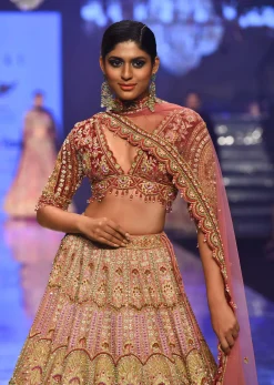 Rose Pink Junoesque Bridal Lehenga In Raw Silk With Heavy Embroidery - NOOR 2022