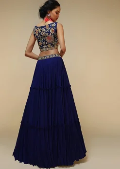Royal Blue Lehenga Choli With Plunging Neckline And Hand Embroidered Using Multi Colored Beads And Resham