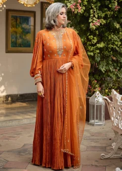 Rust Crepe Anarkali Suit With Pleated Sleeves And Net Dupatta